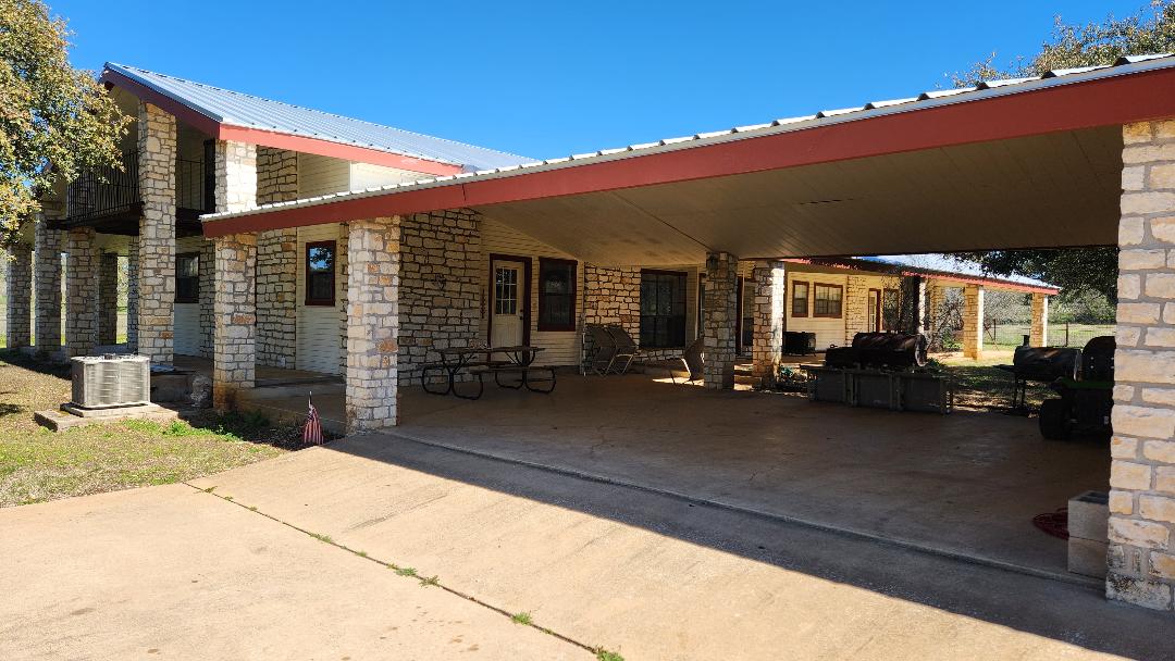 313 Rawhide Road Burnet, TX 78611 - Photo 3 of 17 a view of house with patio