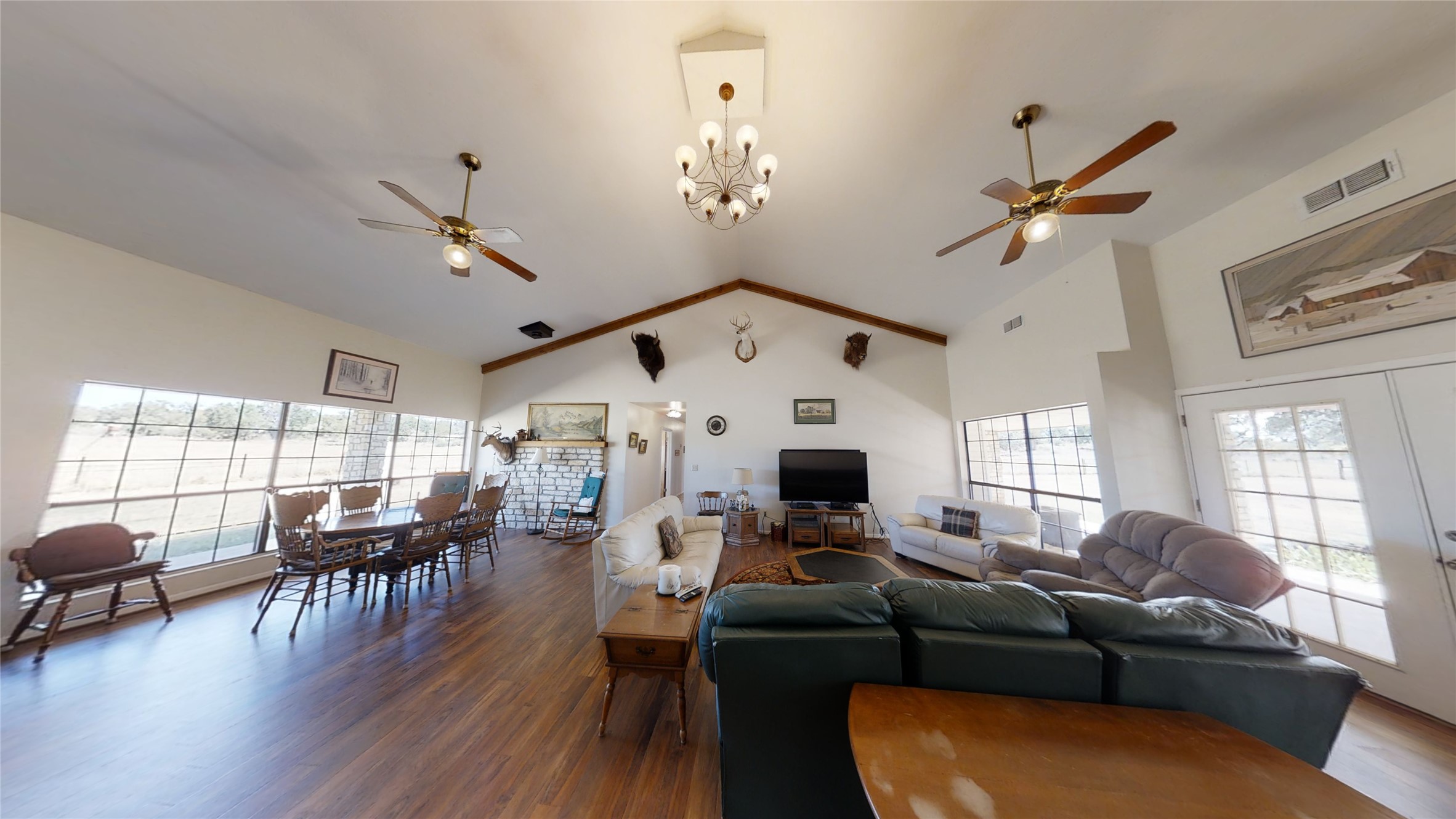 313 Rawhide Road Burnet, TX 78611 - Photo 4 of 17 a living room with furniture ceiling fan and a window