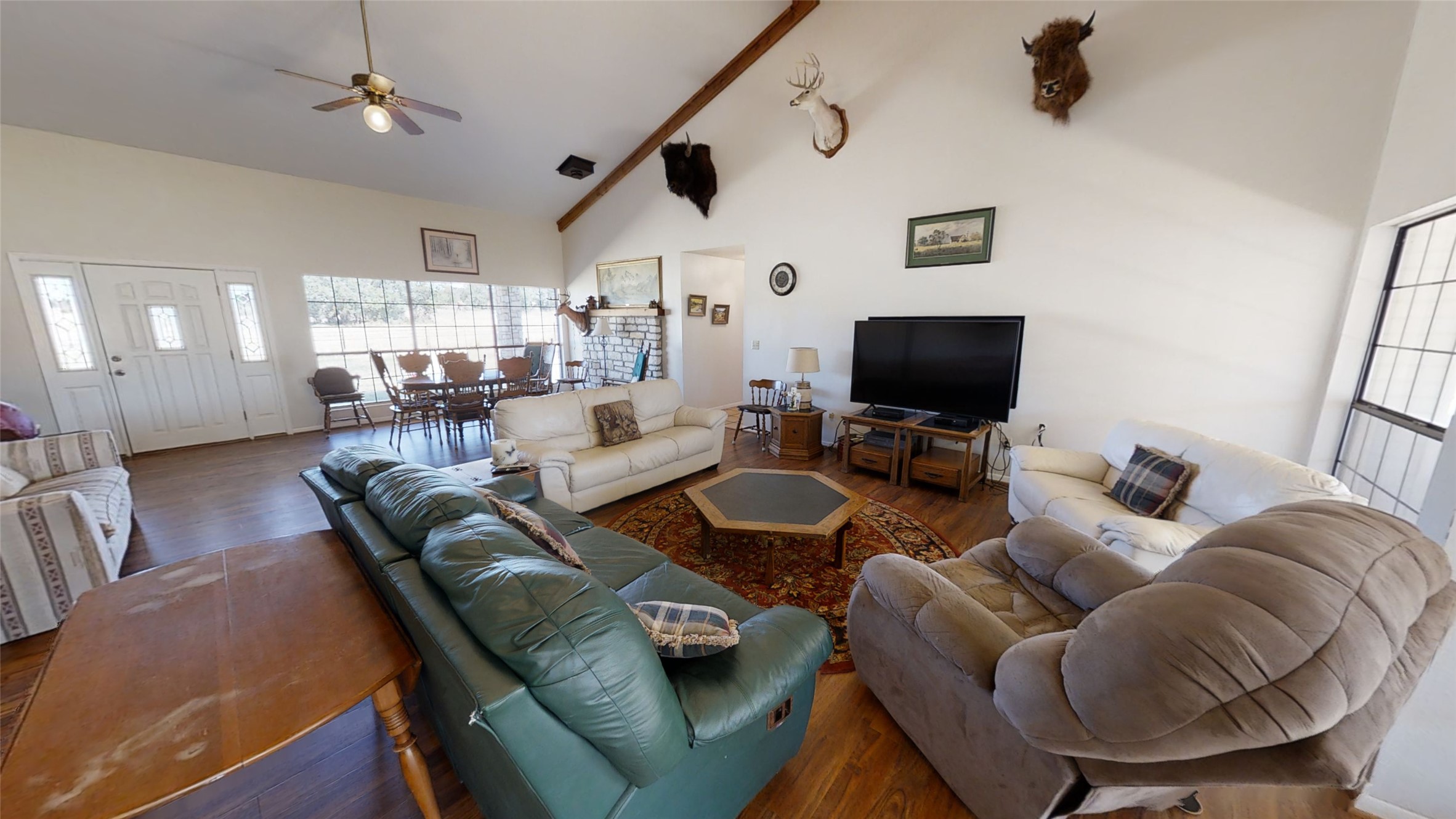 313 Rawhide Road Burnet, TX 78611 - Photo 5 of 17 a living room with furniture and a flat screen tv