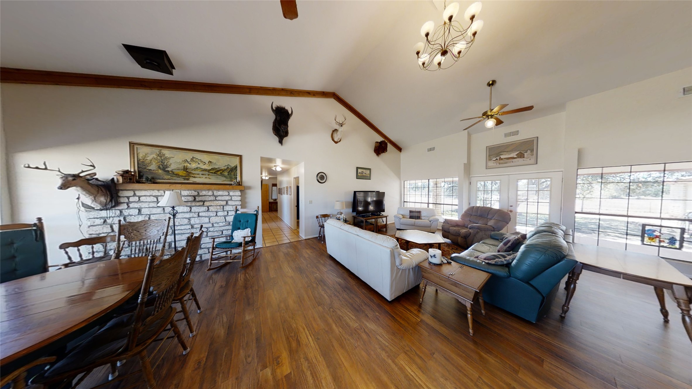313 Rawhide Road Burnet, TX 78611 - Photo 6 of 17 a living room with fireplace furniture and a wooden floor