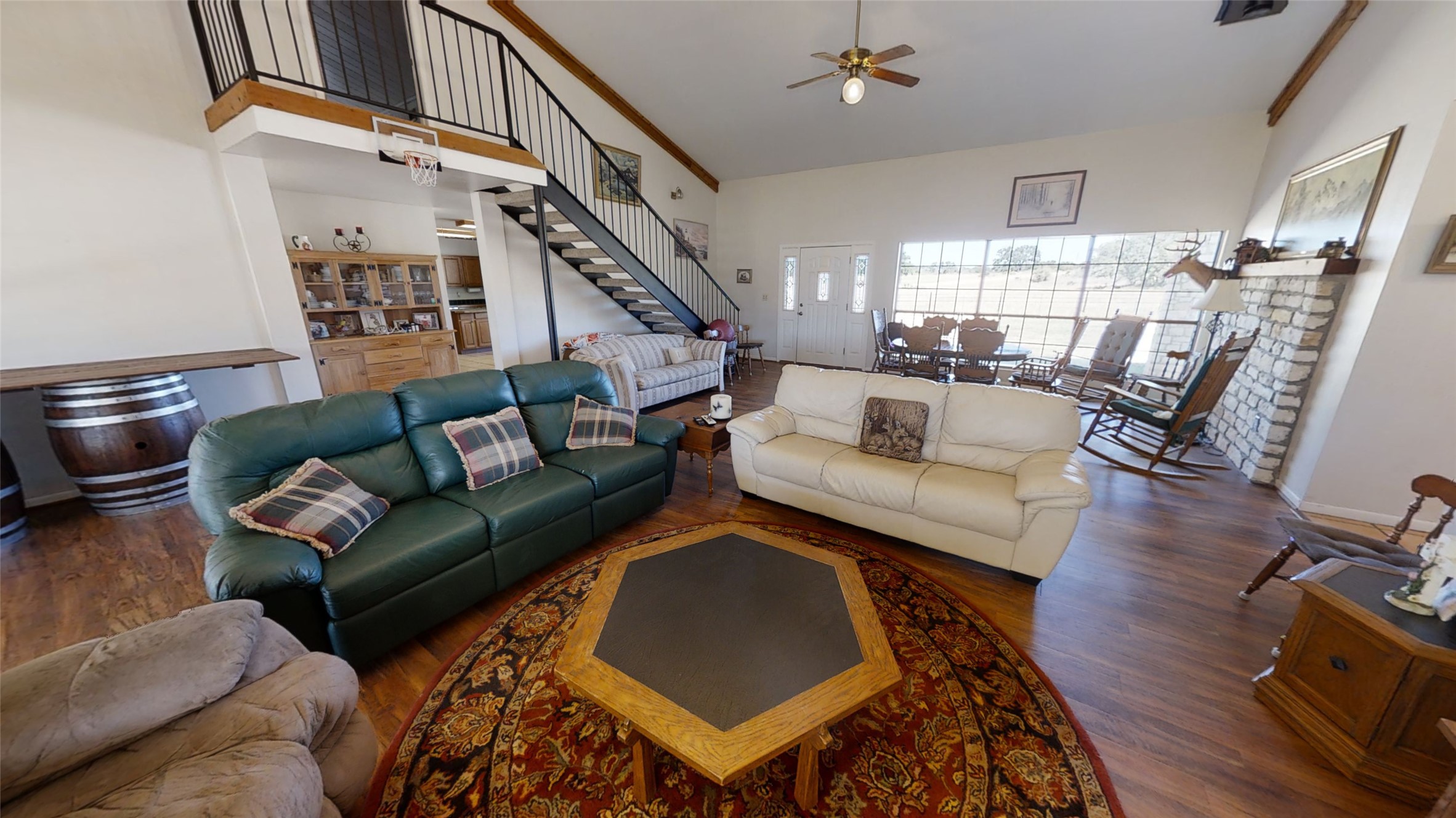 313 Rawhide Road Burnet, TX 78611 - Photo 7 of 17 a living room with furniture and a wooden floor