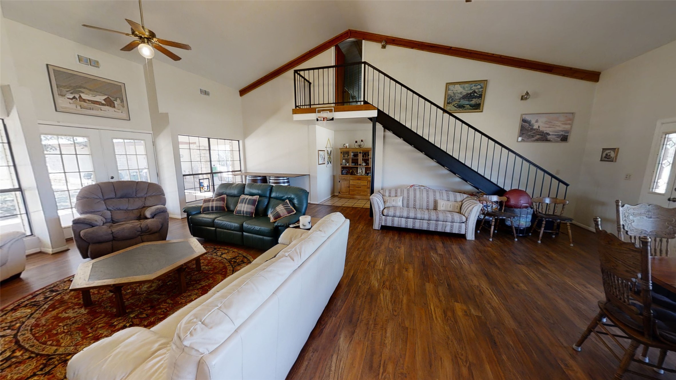 313 Rawhide Road Burnet, TX 78611 - Photo 9 of 17 a living room with furniture and a wooden floor