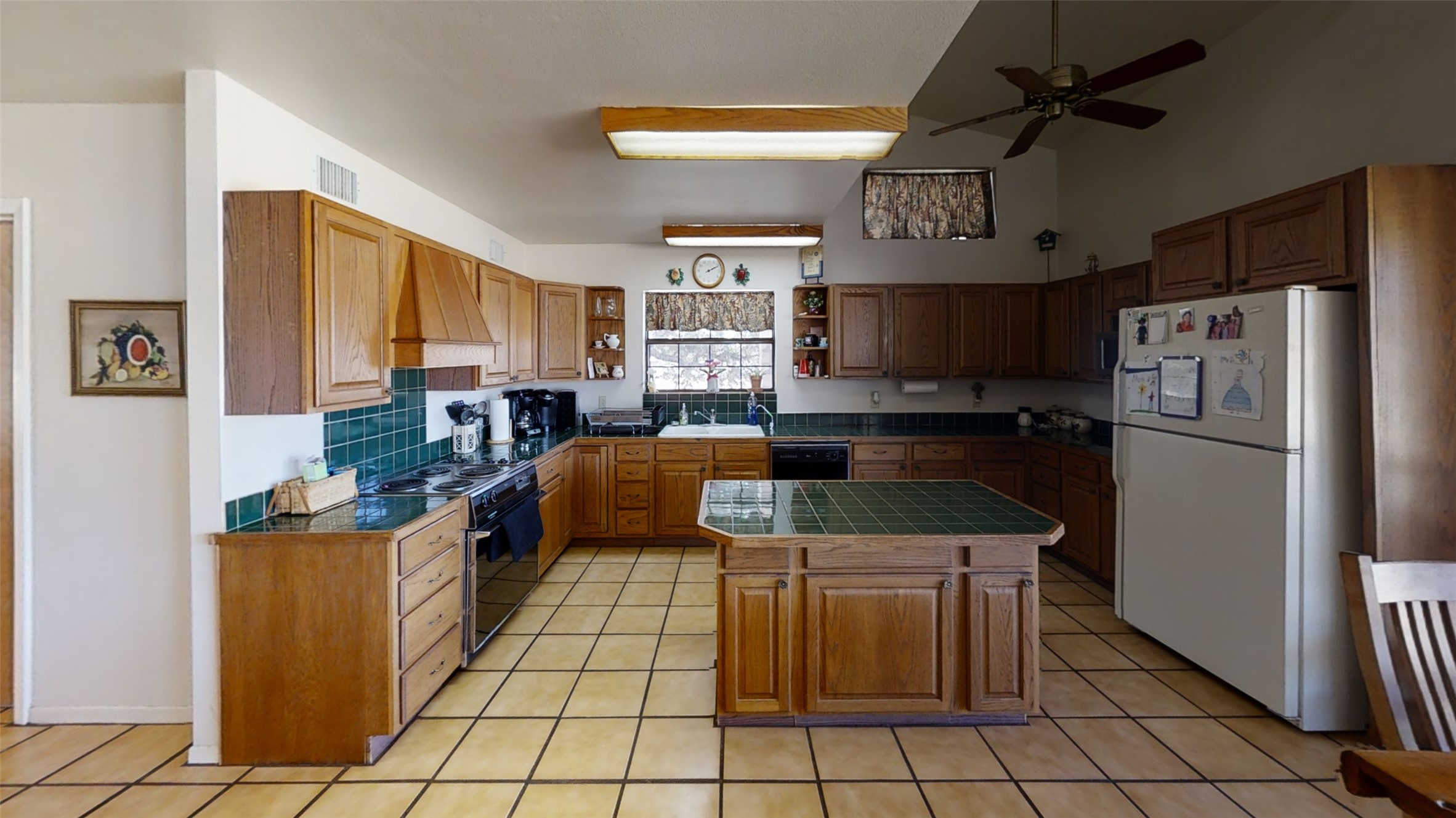 313 Rawhide Road Burnet, TX 78611 - Photo 10 of 17 a kitchen with stainless steel appliances granite countertop a stove top oven a refrigerator a sink and a granite counter tops
