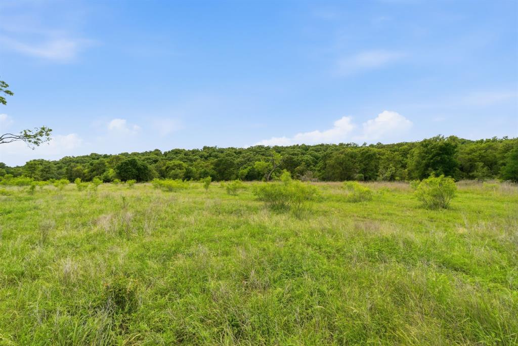 Tbd Old Post Oak Road Bowie, TX 76230 - Photo 30 of 40 a view of a lake with a big yard