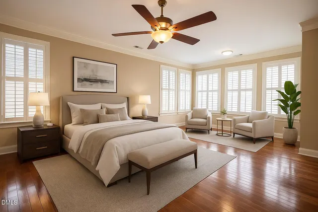 a spacious bedroom with a large bed and a couch