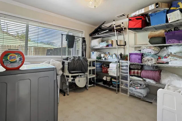 a storage room with washer and dryer