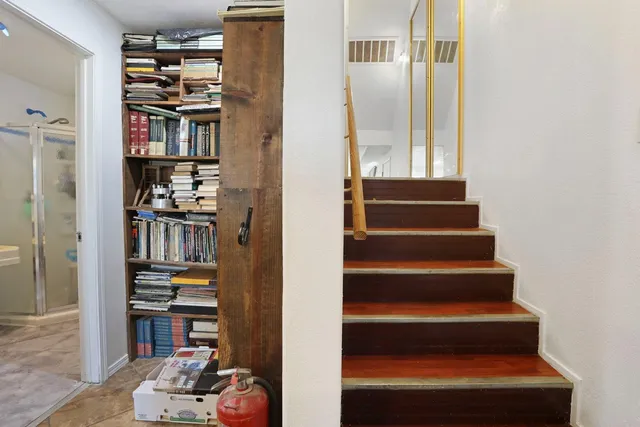 a view of piano and workspace