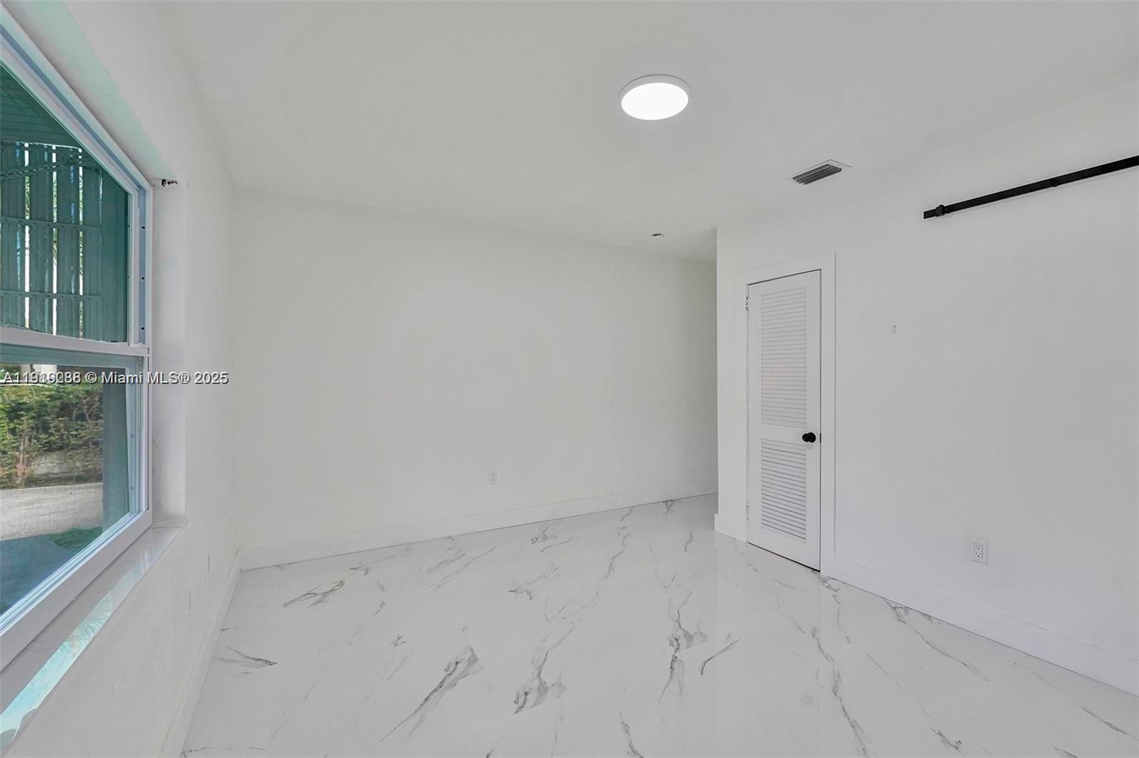 9173 Byron Avenue Surfside, FL 33154 - Photo 18 of 26 a view of room