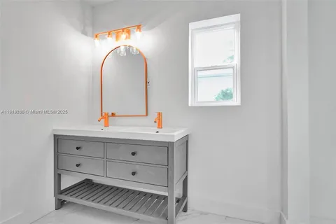 a view of cabinets with wooden floor