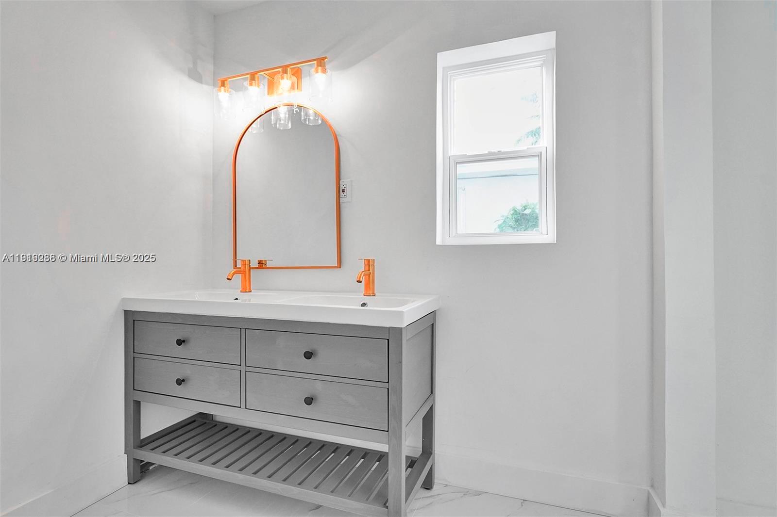 9173 Byron Avenue Surfside, FL 33154 - Photo 22 of 26 a view of cabinets with wooden floor