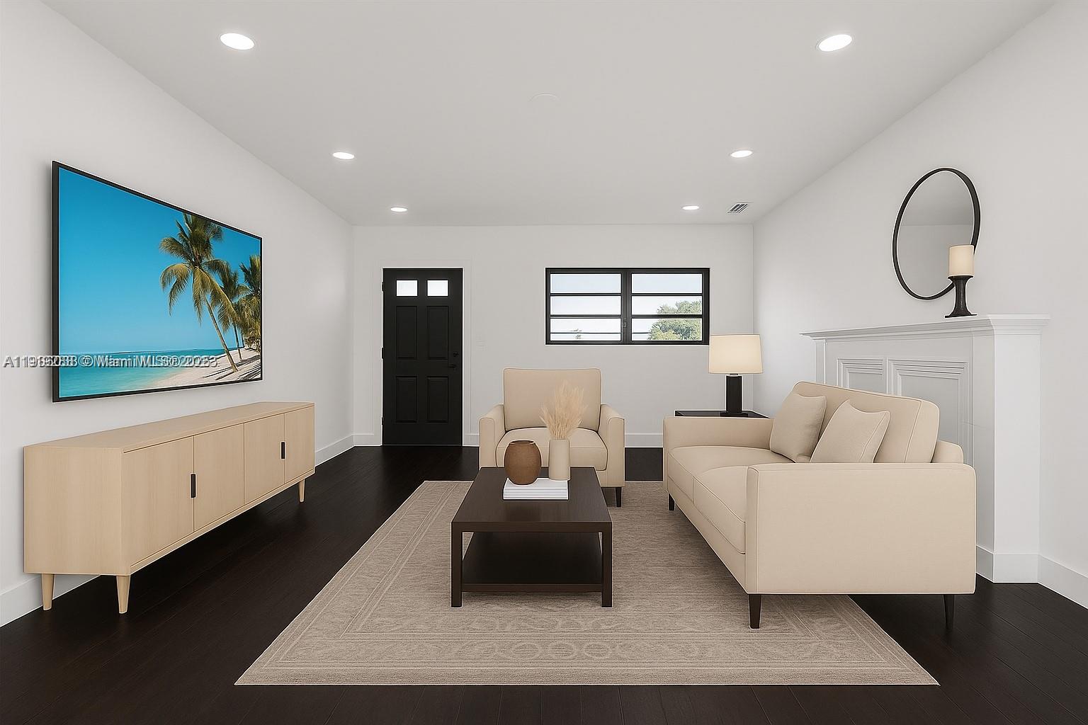 9173 Byron Avenue Surfside, FL 33154 - Photo 4 of 26 a living room with furniture and a mirror