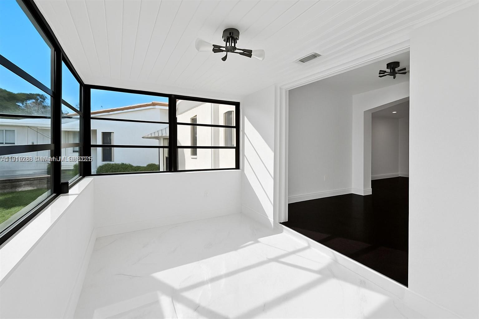 9173 Byron Avenue Surfside, FL 33154 - Photo 7 of 26 a view of front door