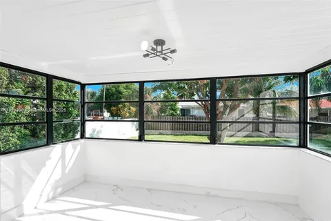 a view of swimming pool from a balcony