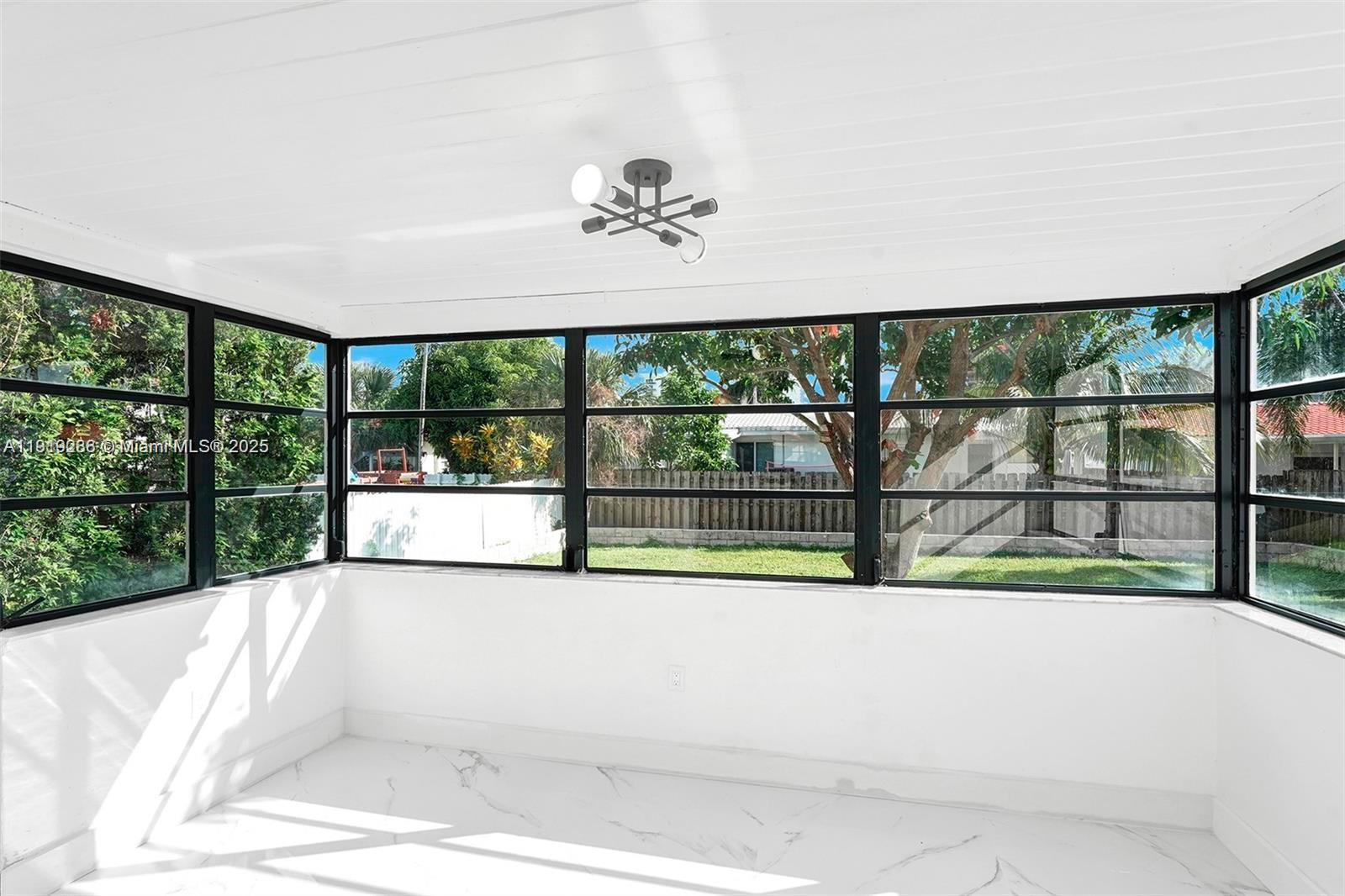 9173 Byron Avenue Surfside, FL 33154 - Photo 9 of 26 a view of swimming pool from a balcony