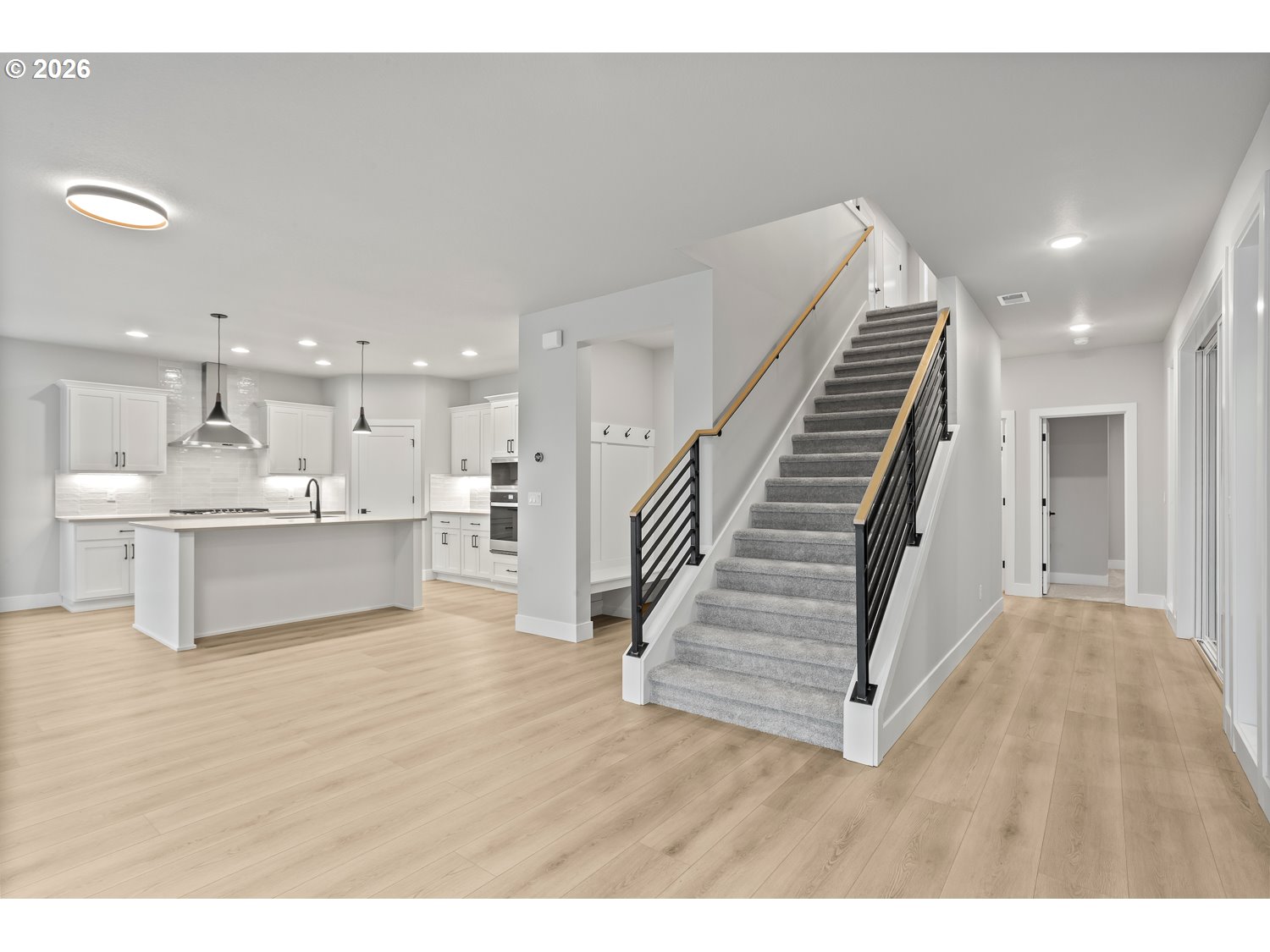 7321 Southwest Windflower Street Wilsonville, OR 97070 - Photo 11 of 20 a view of kitchen with wooden floor