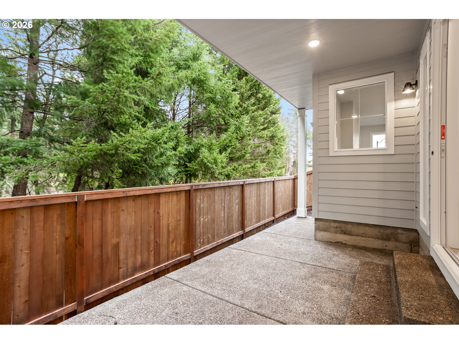 7321 Southwest Windflower Street Wilsonville, OR 97070 - Photo 12 of 20 a view of a backyard with pathway