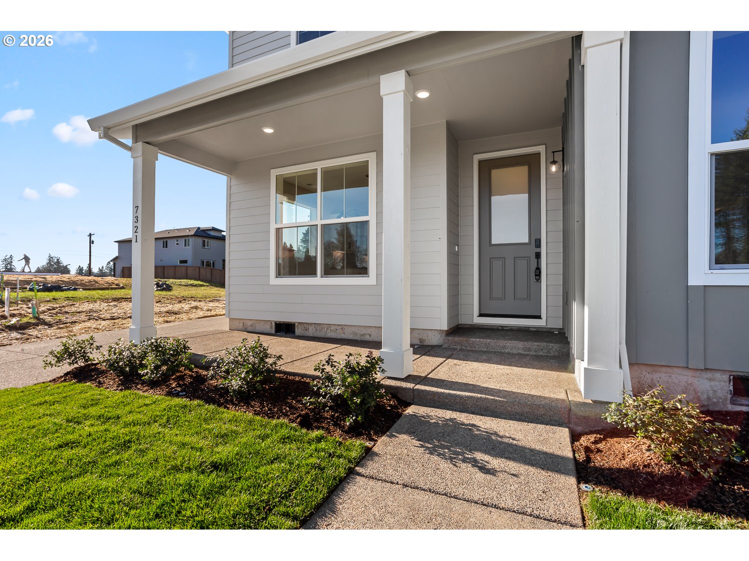 7321 Southwest Windflower Street Wilsonville, OR 97070 - Photo 4 of 20 a view of a house with a garden
