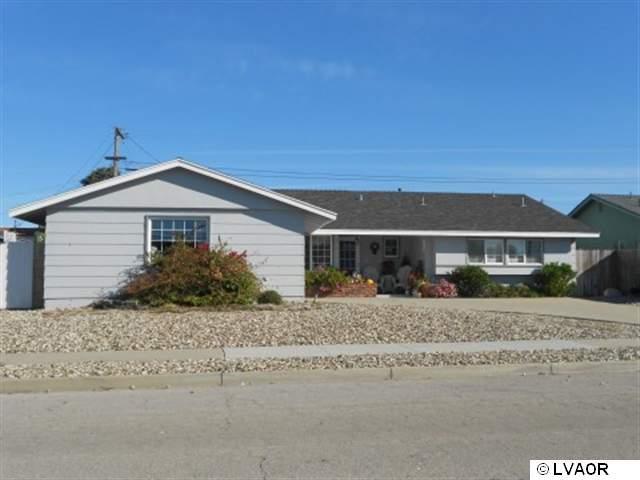 4245 Rigel Avenue Lompoc, CA 93436 - Photo 1 of 5 front view of a house with a yard
