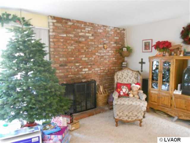 4245 Rigel Avenue Lompoc, CA 93436 - Photo 3 of 5 a outdoor living space with furniture and a potted plant