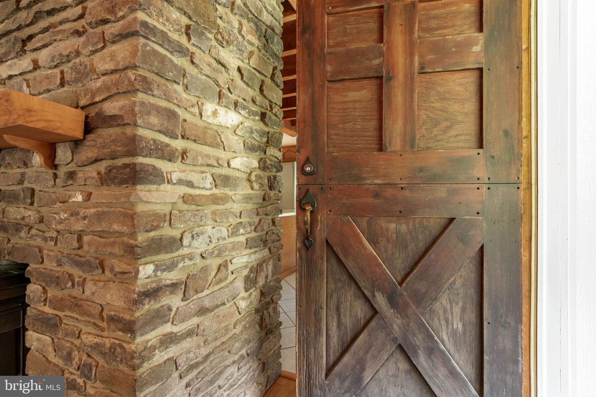 1409 Pleasant View Road Coopersburg, PA 18036 - Photo 14 of 50 Entrance door to LR from screened porch