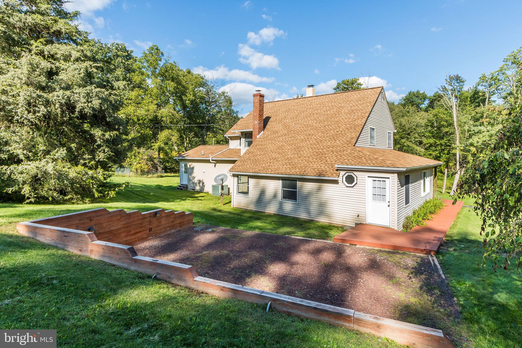 1409 Pleasant View Road Coopersburg, PA 18036 - Photo 33 of 50 Gravel sitting area off side of house