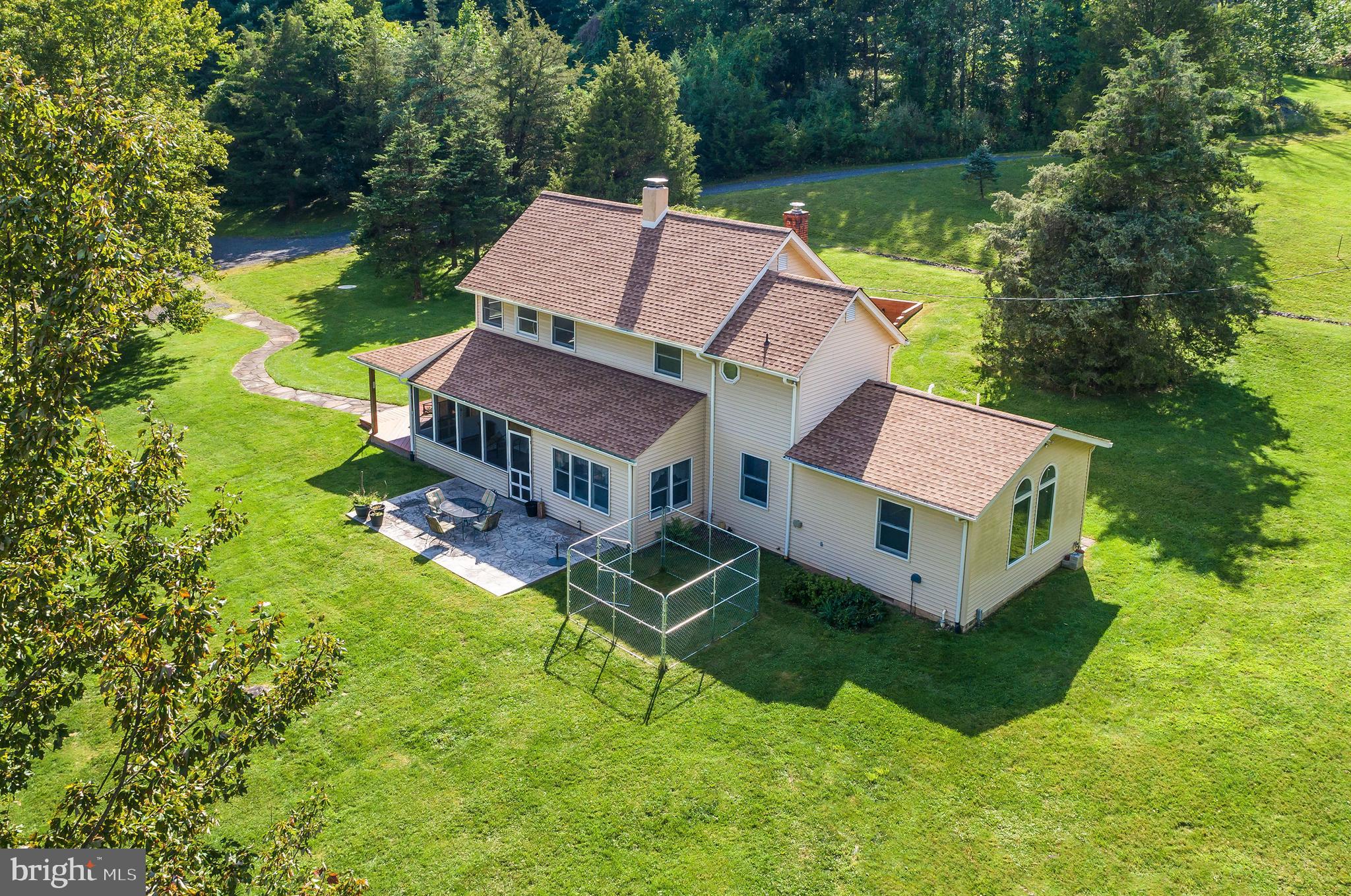 1409 Pleasant View Road Coopersburg, PA 18036 - Photo 42 of 50 View of stone terrace and dog run.
