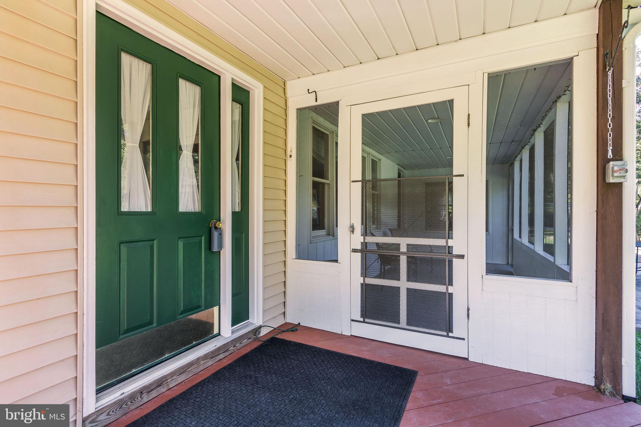 1409 Pleasant View Road Coopersburg, PA 18036 - Photo 6 of 50 Front door/screened porch entrance