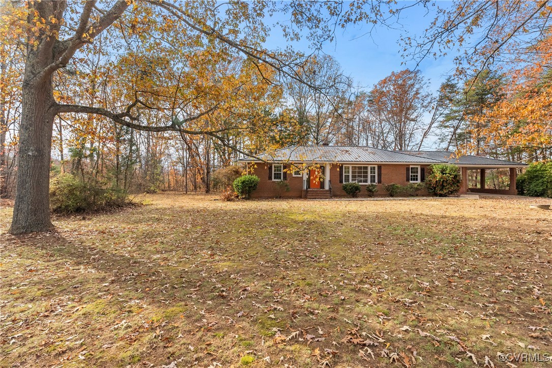 2451 Cumberland Road Farmville, VA 23901 - Photo 2 of 42 a view of house with outdoor space and trees around