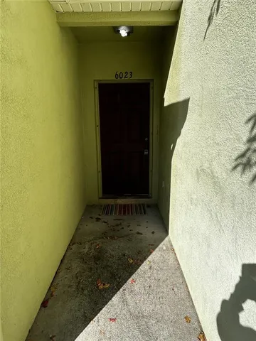 a view of a livingroom with an empty space and a sink