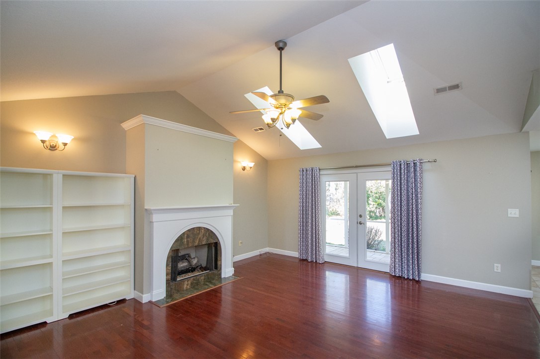 735 Britton Street Anderson, SC 29621 - Photo 12 of 49 This airy living space features a cozy fireplace and direct outdoor access.
