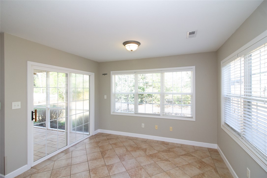 735 Britton Street Anderson, SC 29621 - Photo 17 of 49 Bright and airy, this room features expansive windows and durable tile flooring.