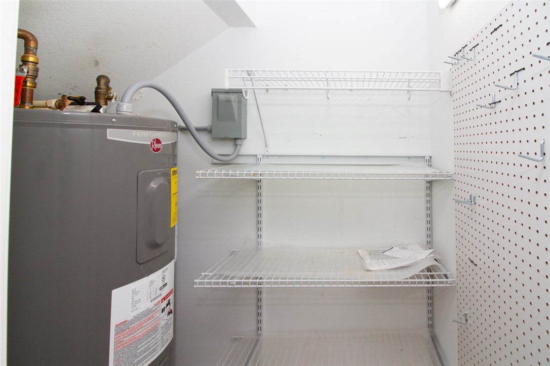 735 Britton Street Anderson, SC 29621 - Photo 44 of 49 This functional utility space features essential equipment and convenient storage solutions.