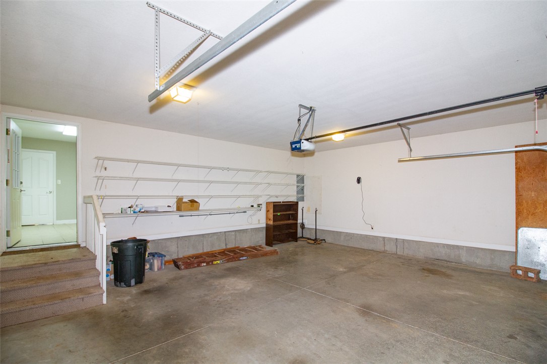 735 Britton Street Anderson, SC 29621 - Photo 45 of 49 This spacious garage offers practical storage solutions with shelving, perfect for organization.