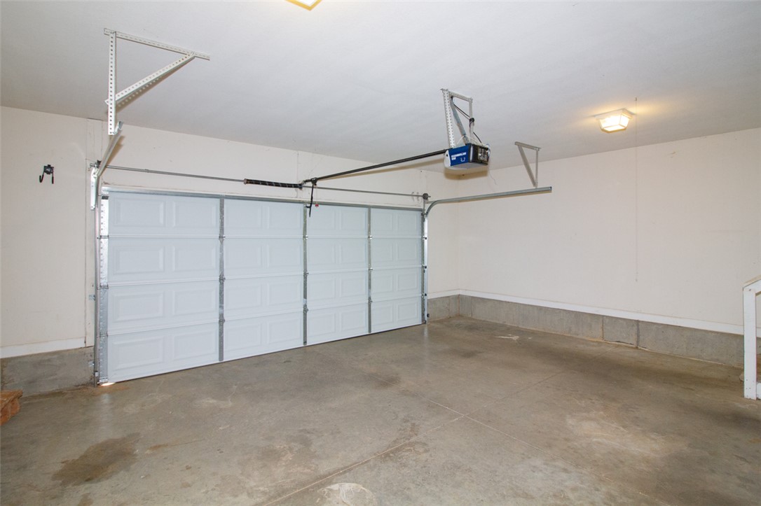 735 Britton Street Anderson, SC 29621 - Photo 46 of 49 This spacious garage offers practical storage and secure vehicle parking with its functional design.
