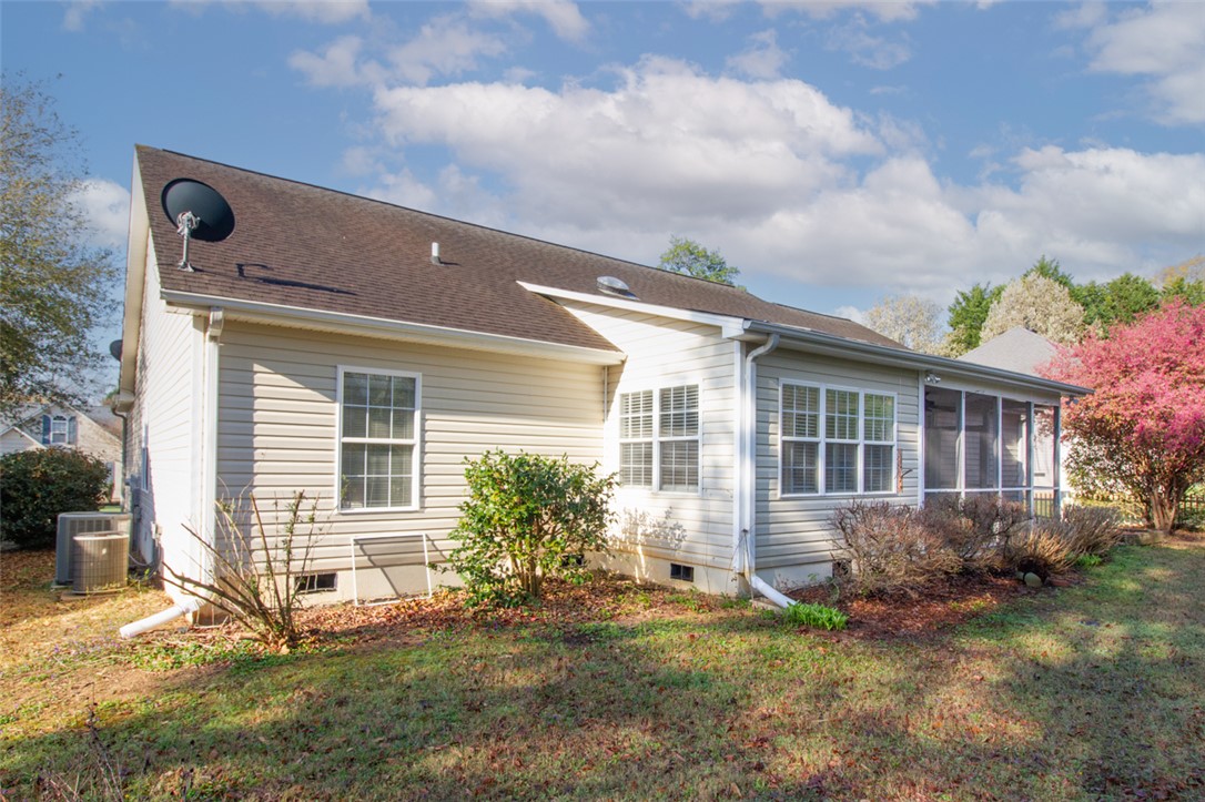 735 Britton Street Anderson, SC 29621 - Photo 48 of 49 This home features a screened porch and a well-maintained exterior, offering comfortable outdoor living.