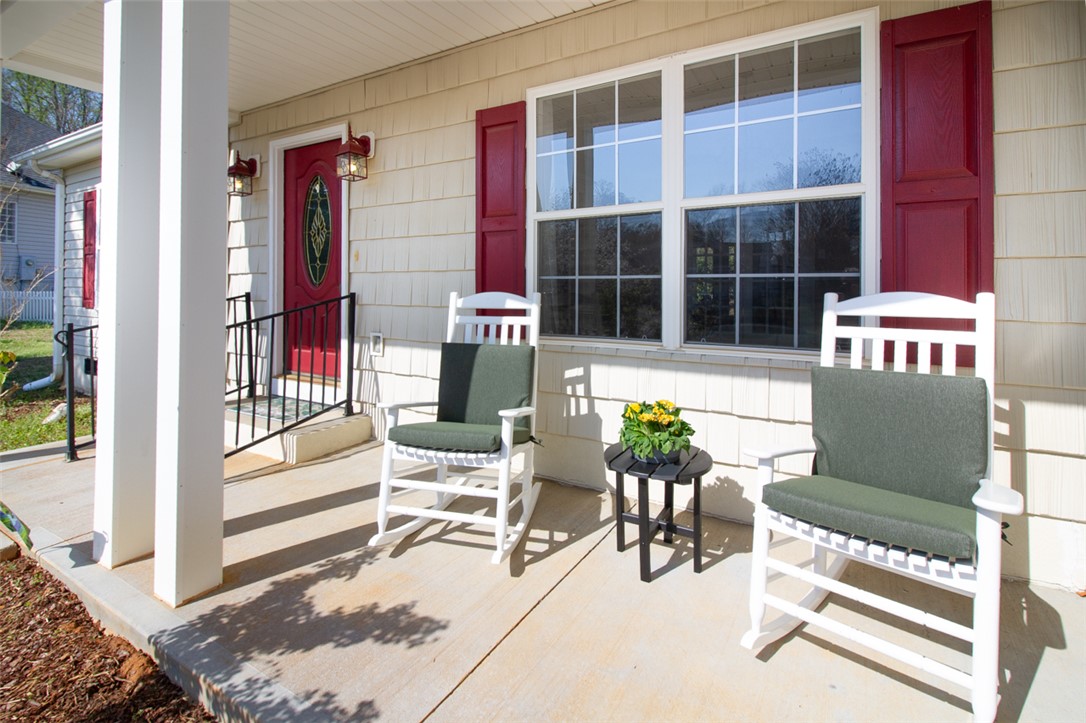 735 Britton Street Anderson, SC 29621 - Photo 6 of 49 This charming home offers a welcoming front porch, perfect for enjoying peaceful moments outdoors.
