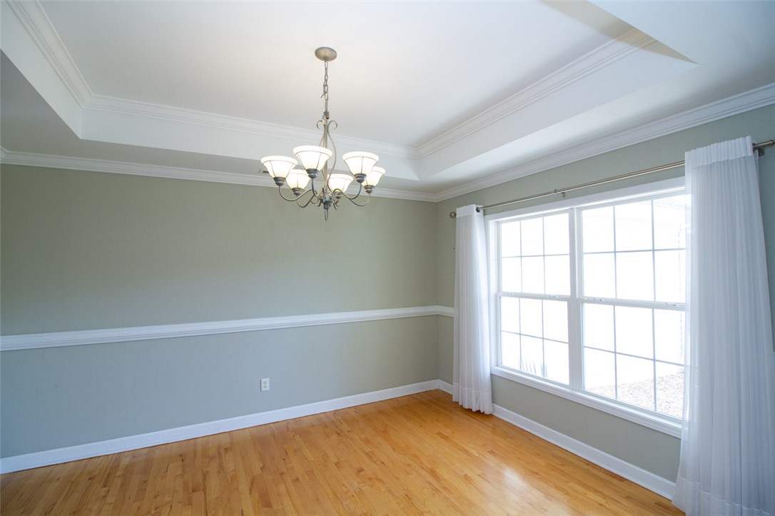 735 Britton Street Anderson, SC 29621 - Photo 10 of 49 This bright room features beautiful hardwood floors and elegant tray ceilings.