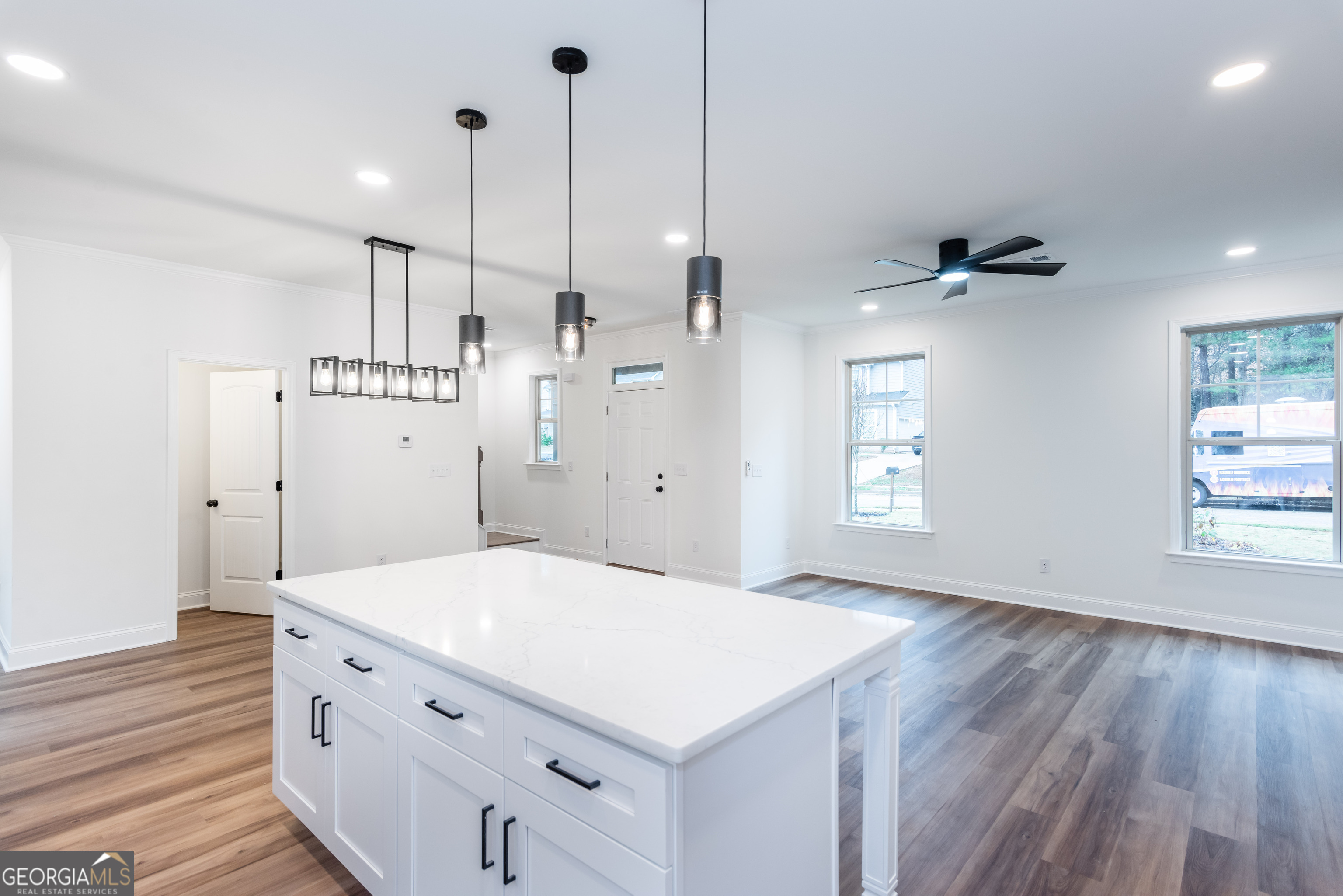 3342 Landings S Drive Southwest Atlanta, GA 30331 - Photo 11 of 34 a kitchen with a wooden floor and white appliances