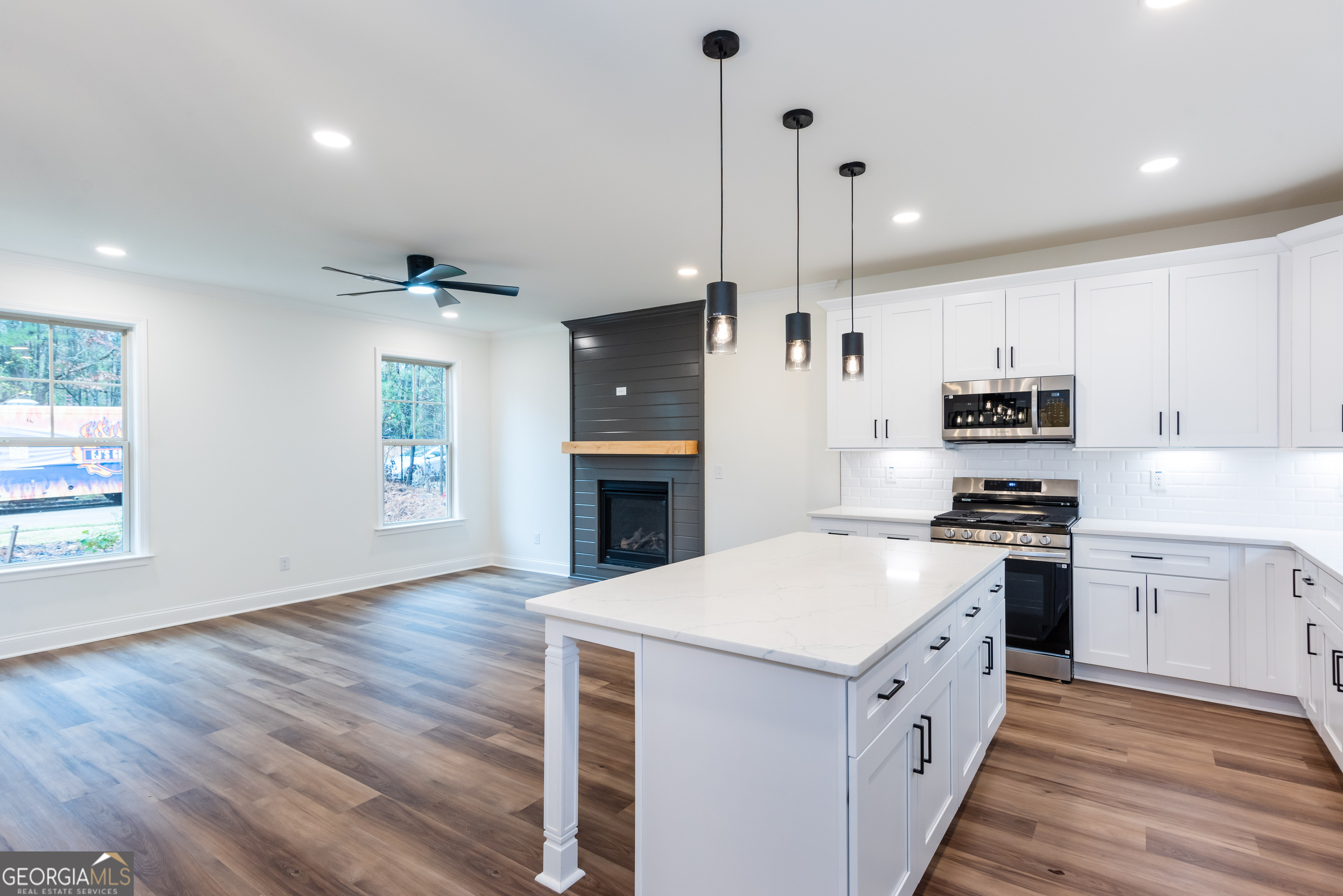 3342 Landings S Drive Southwest Atlanta, GA 30331 - Photo 13 of 34 a kitchen with stove cabinets and wooden floor