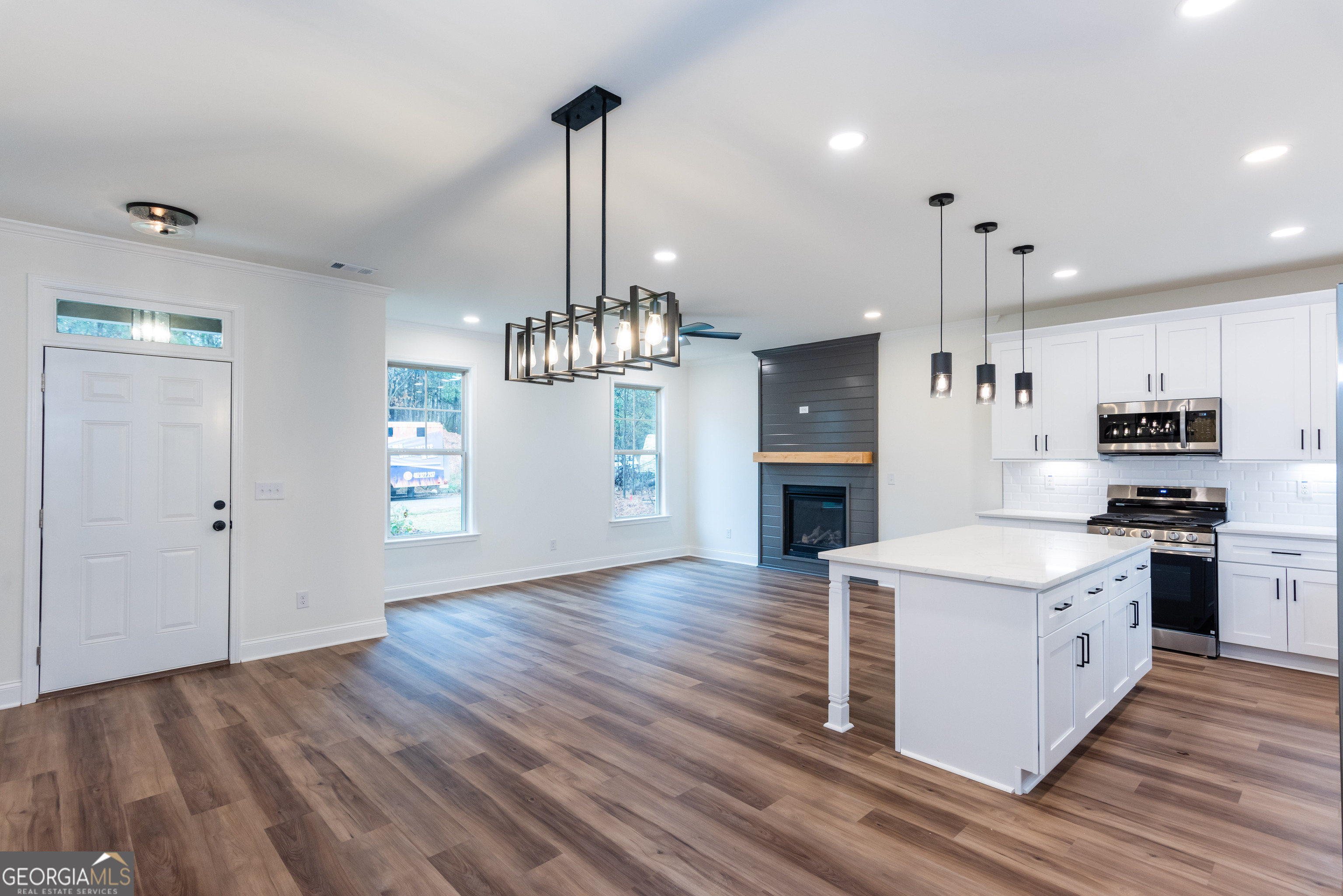 3342 Landings S Drive Southwest Atlanta, GA 30331 - Photo 15 of 34 a kitchen with stainless steel appliances granite countertop a sink refrigerator and cabinets