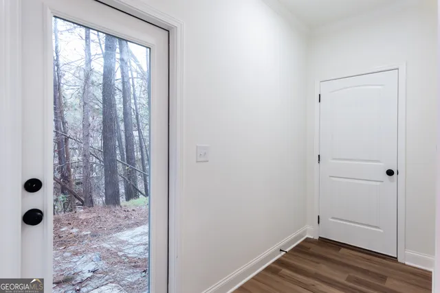 a bathroom with a sink a mirror and vanity
