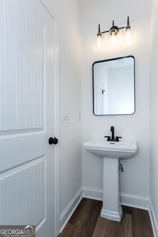 a view of a hallway with a door