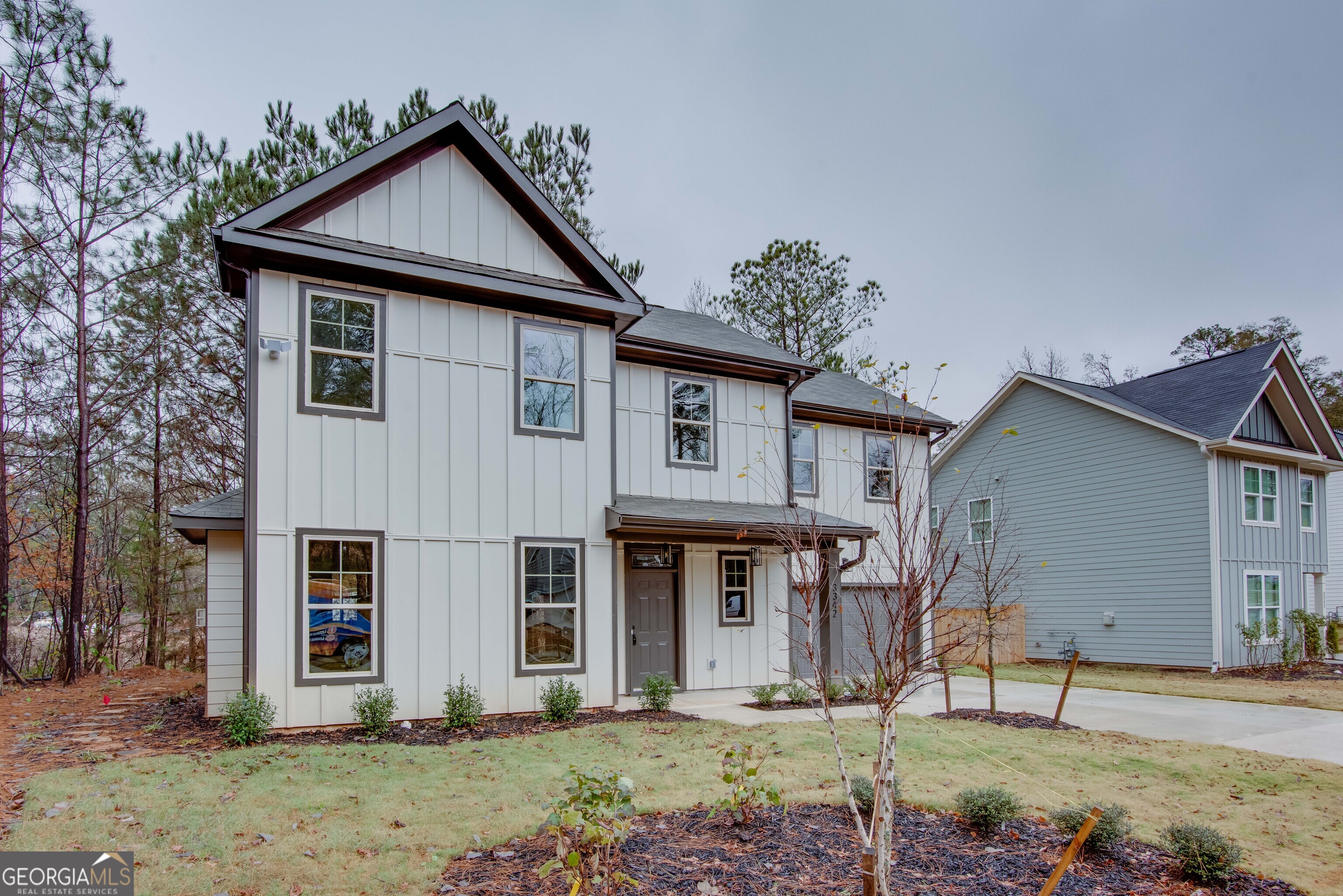 3342 Landings S Drive Southwest Atlanta, GA 30331 - Photo 2 of 34 a front view of a house with garden