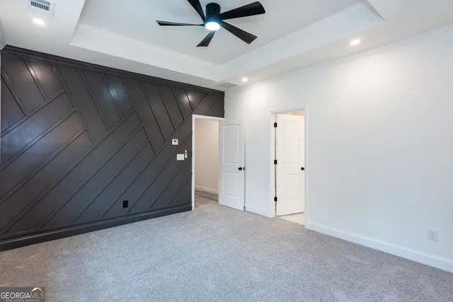a bathroom with a double vanity sink mirror and shower