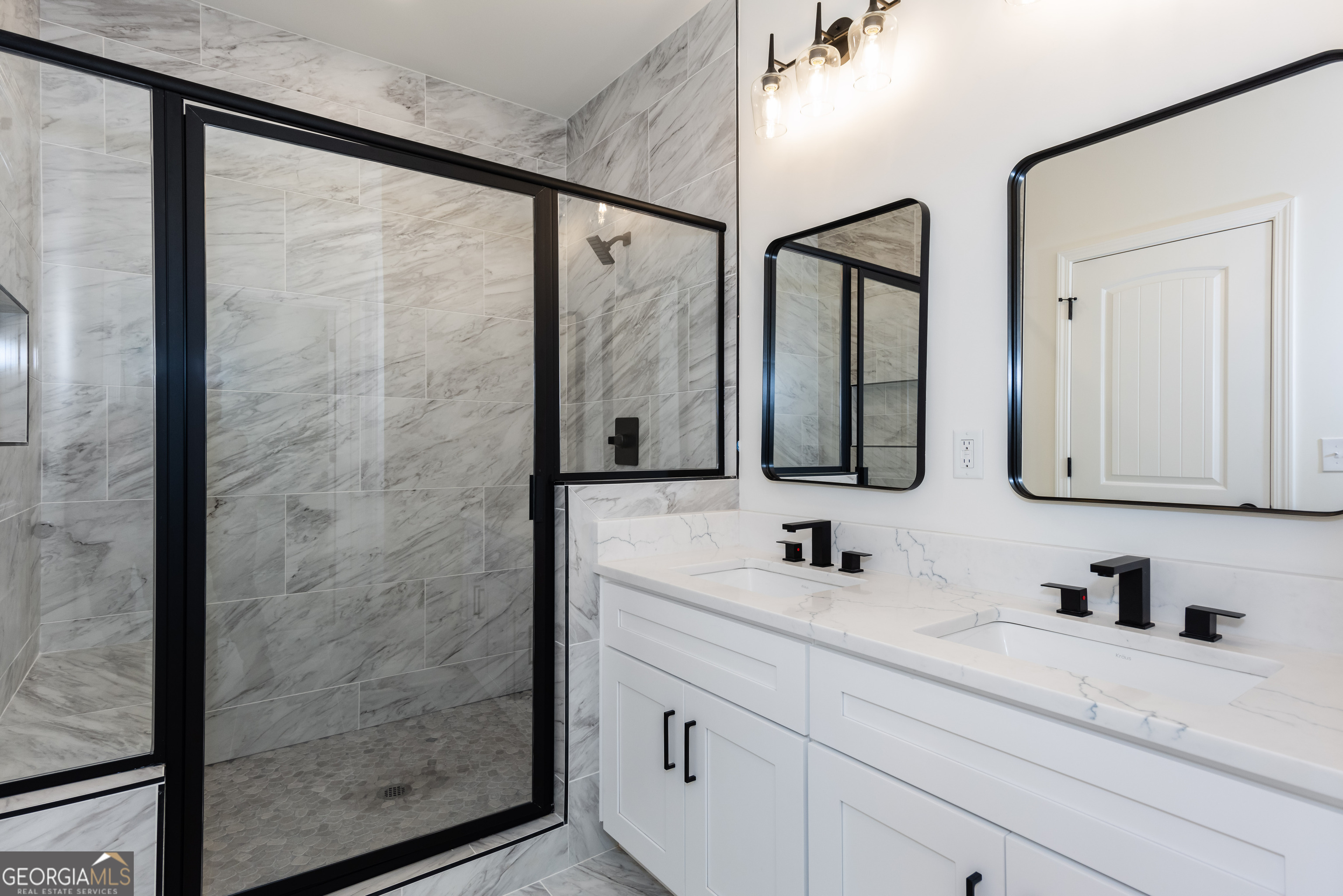 3342 Landings S Drive Southwest Atlanta, GA 30331 - Photo 22 of 34 a bathroom with a double vanity sink mirror and shower