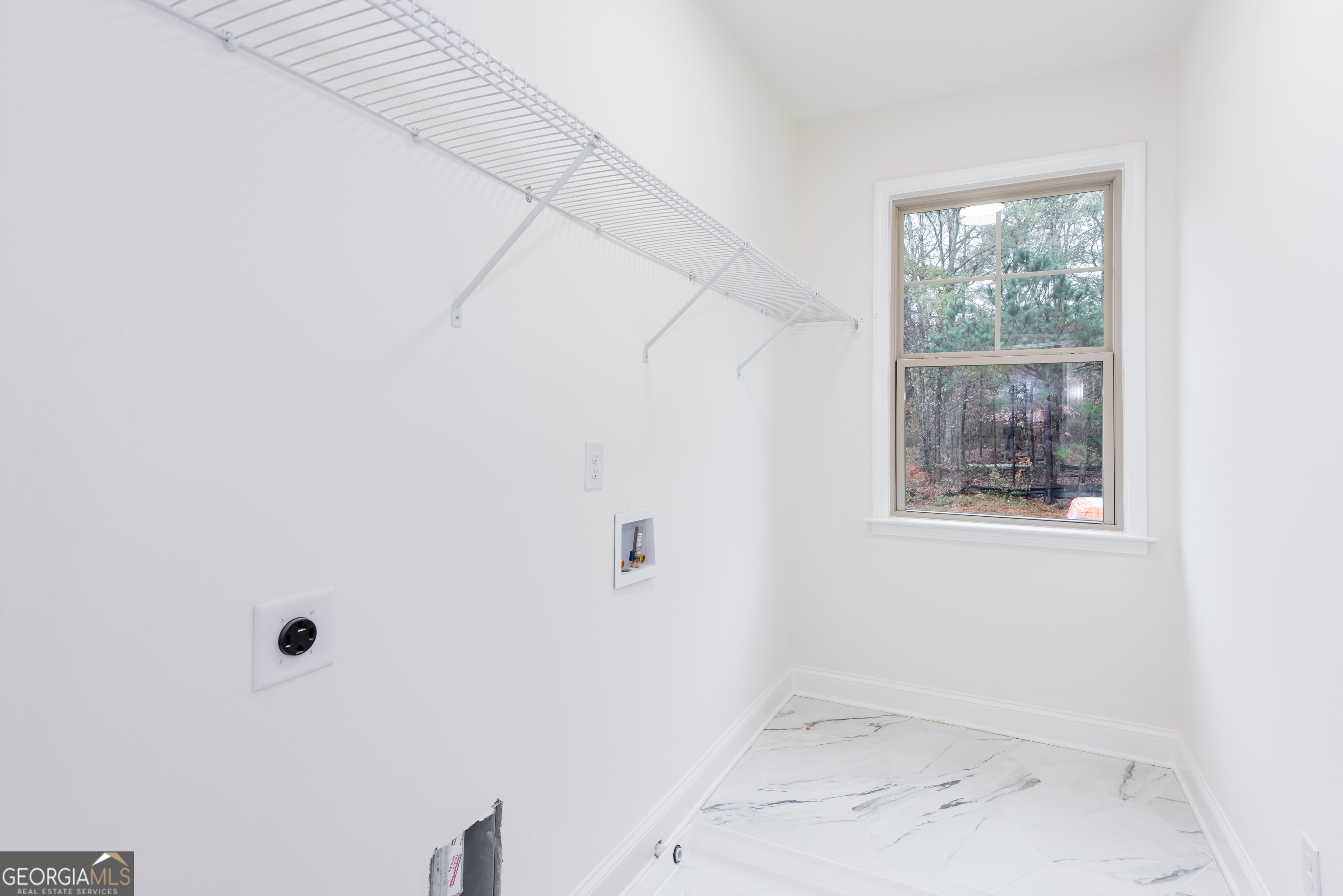 3342 Landings S Drive Southwest Atlanta, GA 30331 - Photo 28 of 34 a bathroom with a window and a shower