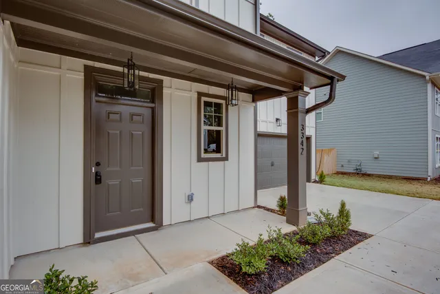 a front view of a house with a garage