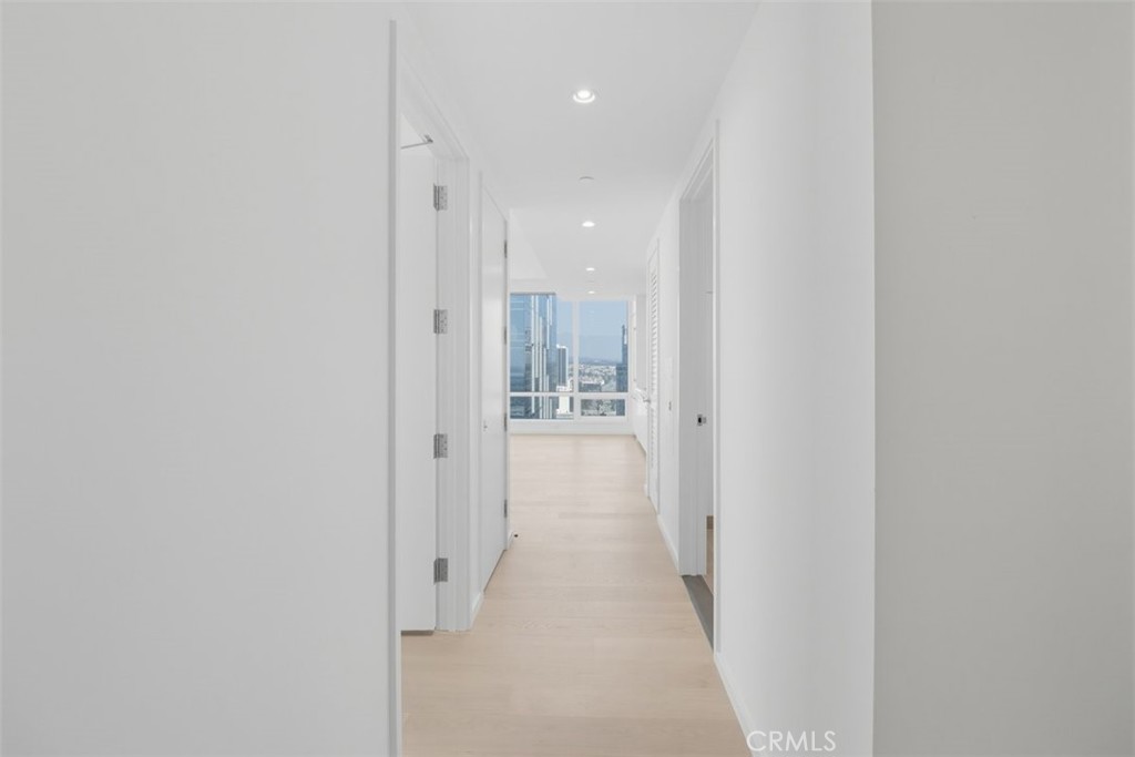 877 Francisco Street, Unit 3102 Los Angeles, CA 90017 - Photo 12 of 36 a view of a hallway with a white walls