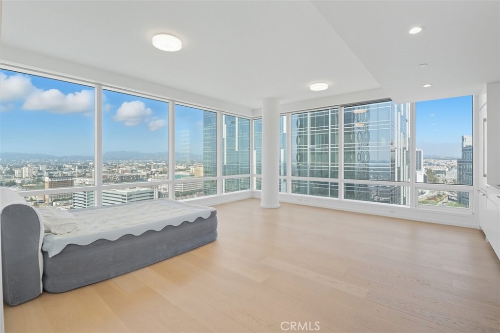 877 Francisco Street, Unit 3102 Los Angeles, CA 90017 - Photo 14 of 36 a view of an empty room with a floor to ceiling window and an outdoor view