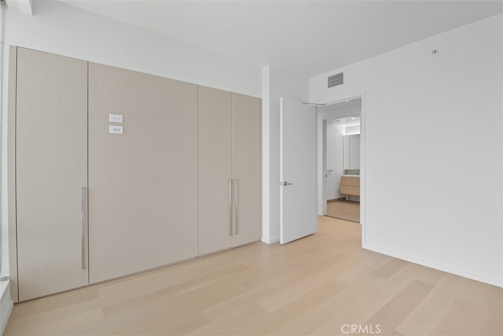 877 Francisco Street, Unit 3102 Los Angeles, CA 90017 - Photo 17 of 36 a view of a room with white walls